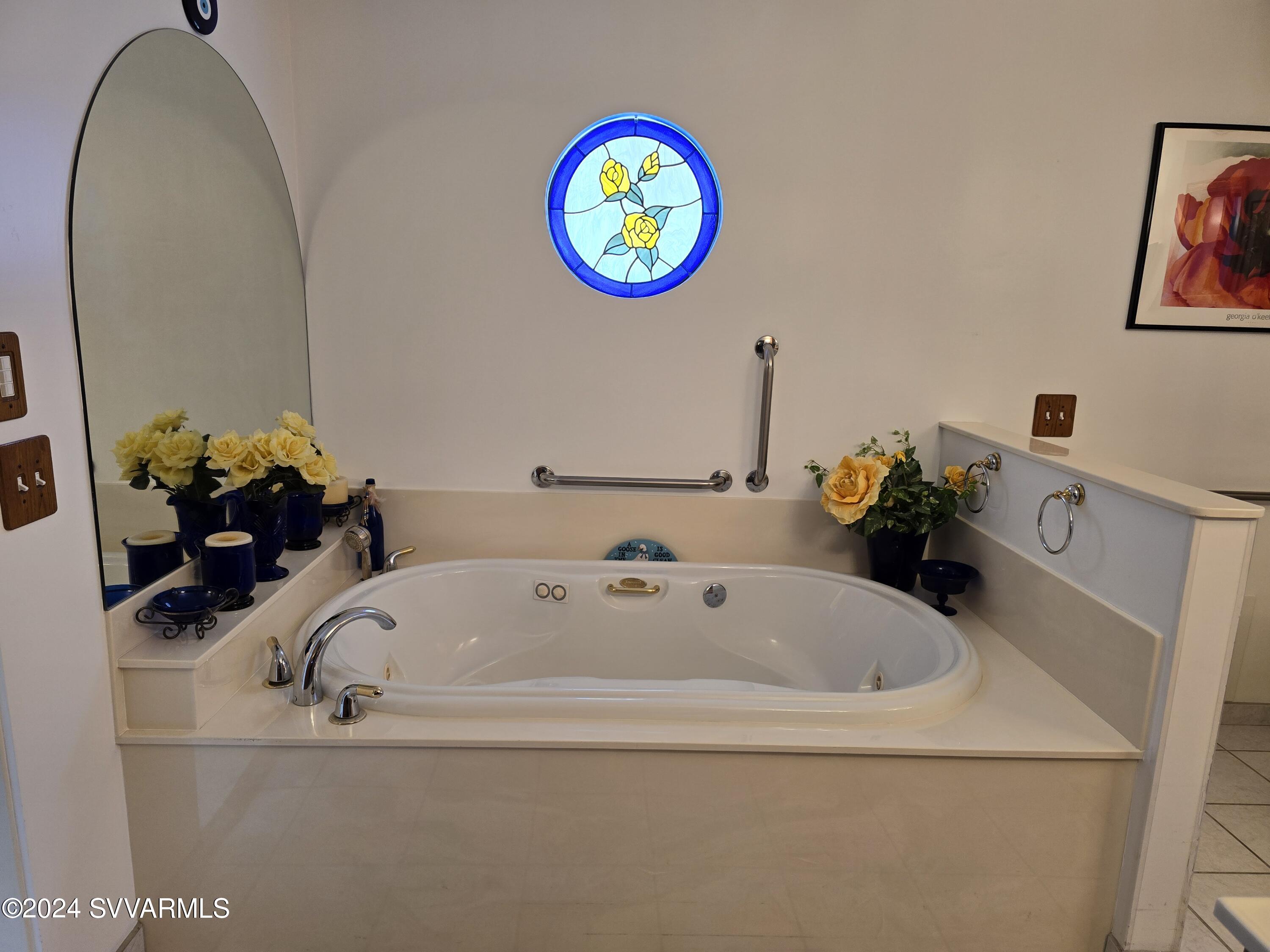 1707 Sawmill Road Cottonwood, AZ 86326 - Photo 25 of 93 a bathroom with a sink and a mirror