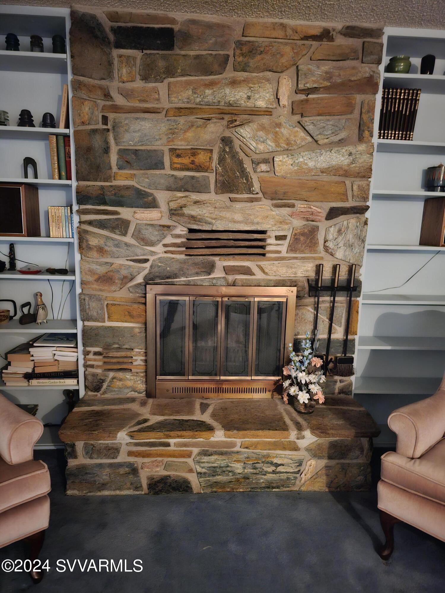 1707 Sawmill Road Cottonwood, AZ 86326 - Photo 39 of 93 Fireplace in formal dining room