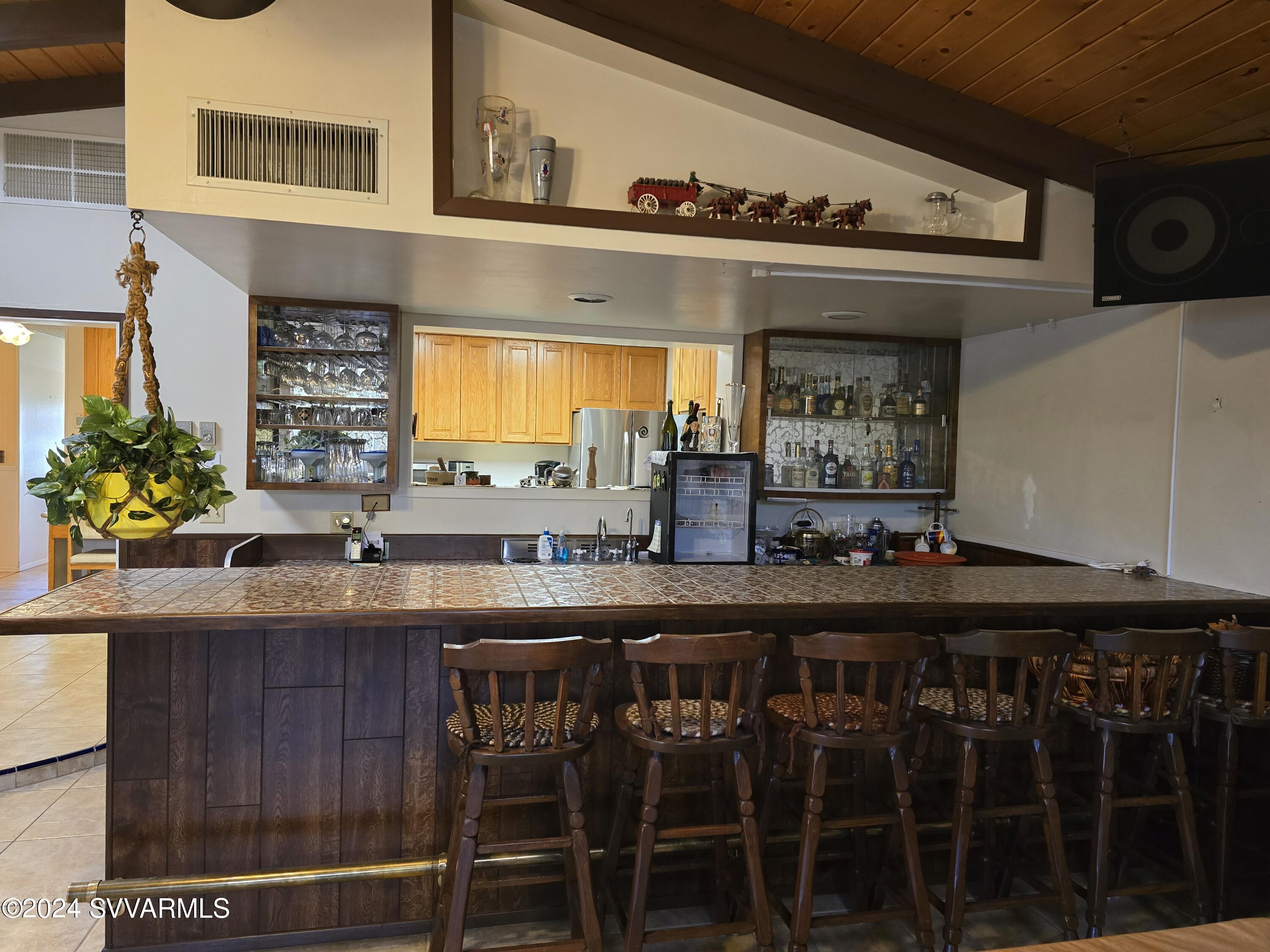 1707 Sawmill Road Cottonwood, AZ 86326 - Photo 54 of 93 a kitchen with stainless steel appliances a sink and cabinets