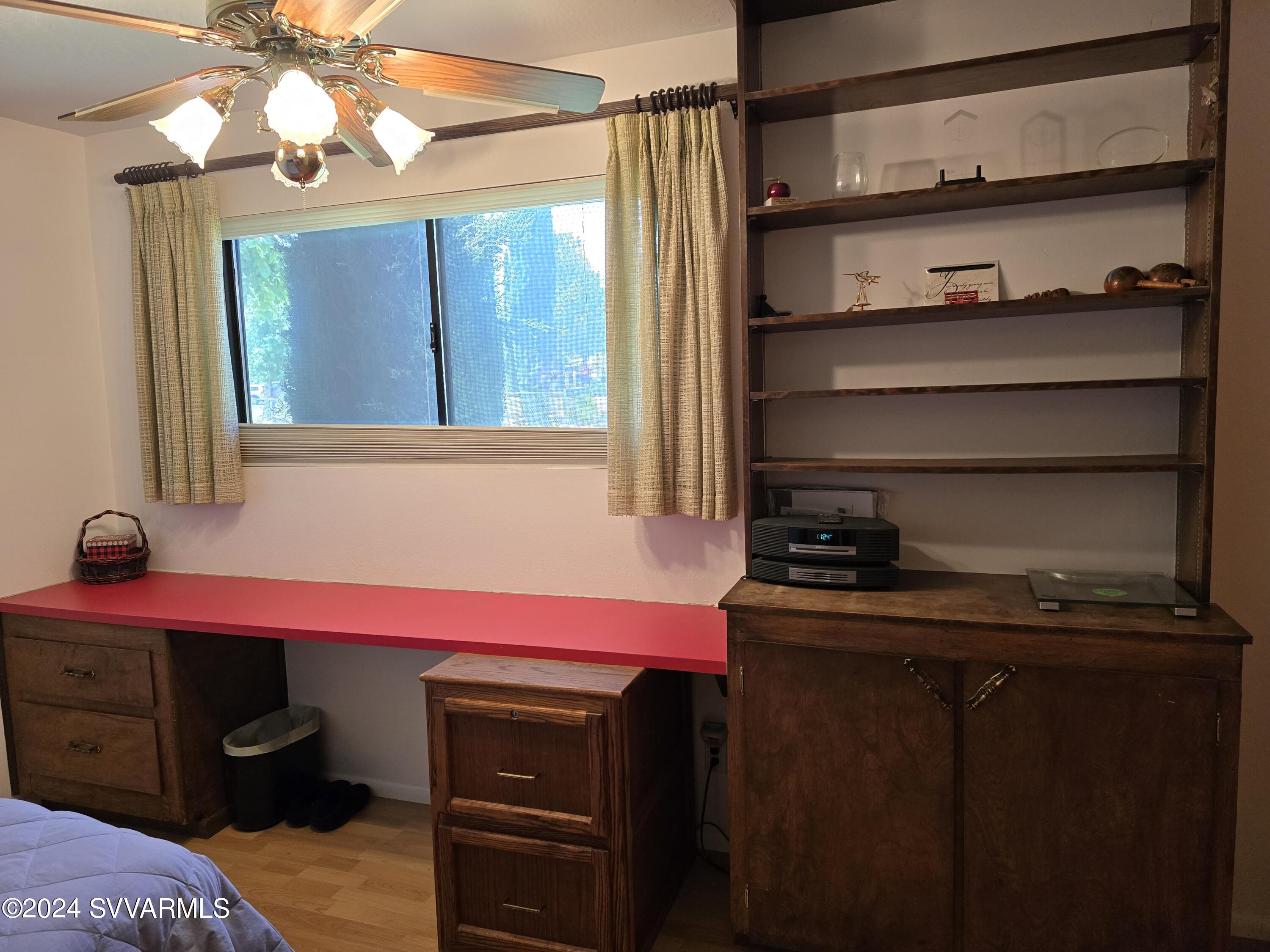 1707 Sawmill Road Cottonwood, AZ 86326 - Photo 60 of 93 a bedroom with a bed and a dresser