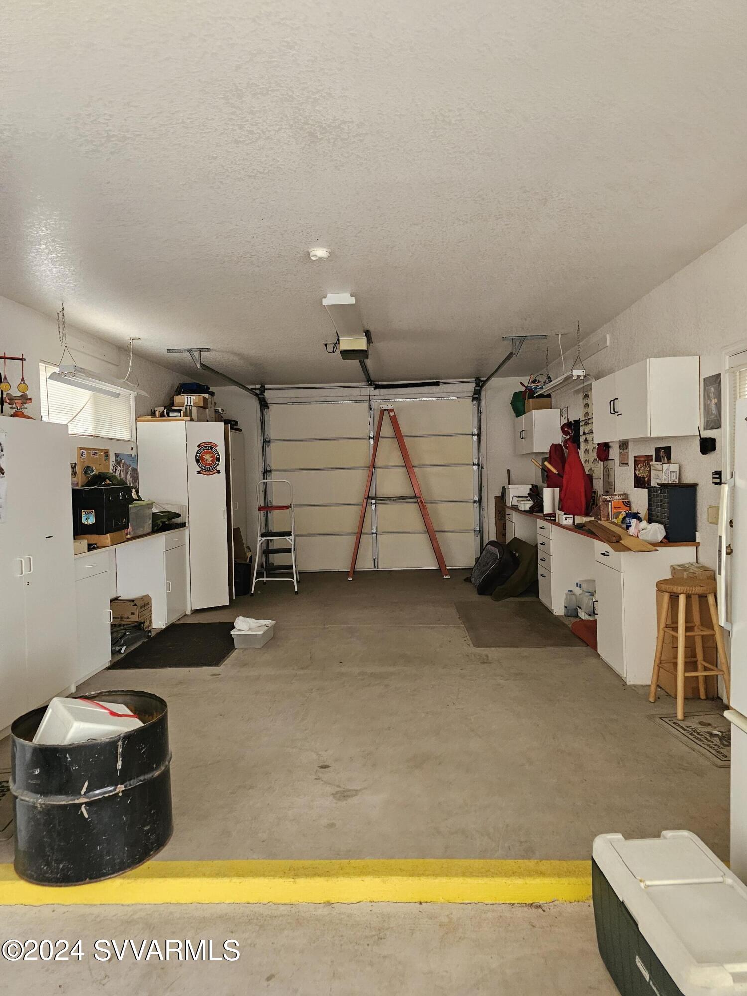 1707 Sawmill Road Cottonwood, AZ 86326 - Photo 86 of 93 a storage room with washer and dryer