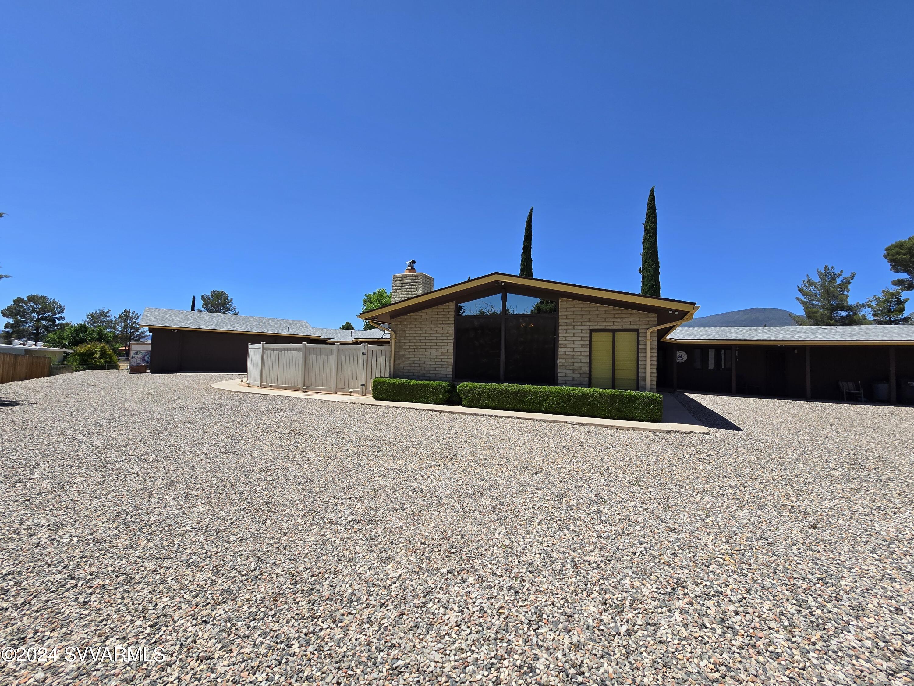 1707 Sawmill Road Cottonwood, AZ 86326 - Photo 9 of 93 a front view of a house with a yard