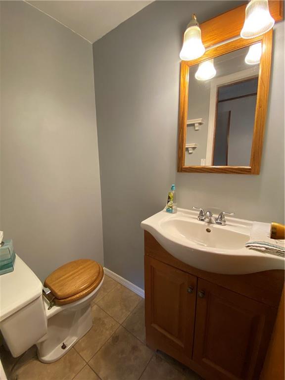 322 Thompson Run Road Ellwood City, PA 16117 - Photo 13 of 25 Adorable half bath is situated between the bedrooms