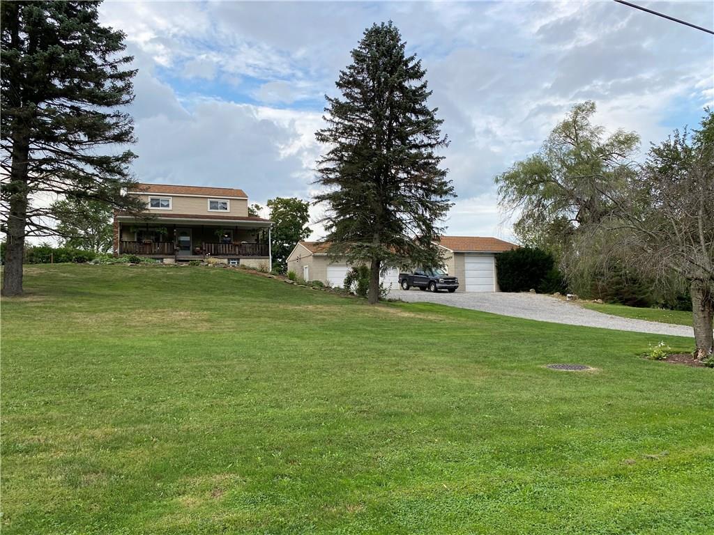 Well-maintained, MOVE-IN READY house.... plus AMAZING detached garage.  