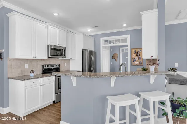 $475,000 | 100 Scotlands Court, Hampstead, NC 28443