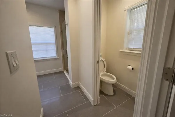 a kitchen with a sink and a window