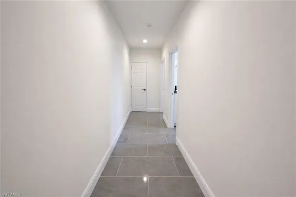 a bathroom with a double vanity sink toilet and shower