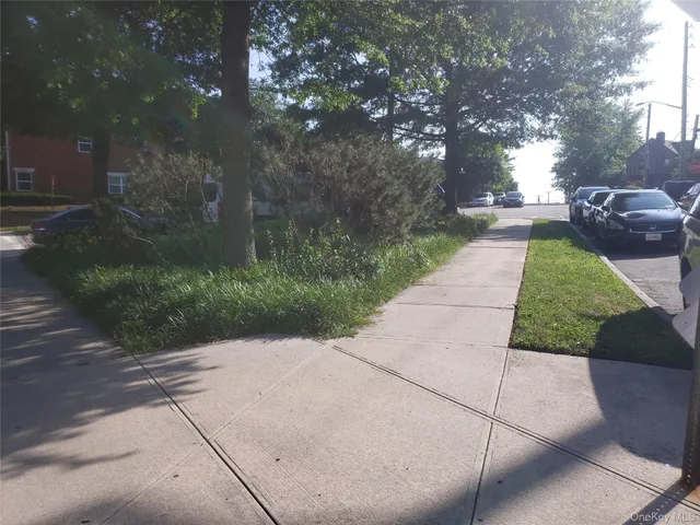 a view of backyard with outdoor seating