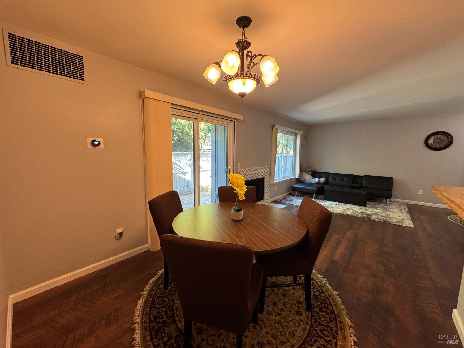 58 Scottsdale Way Novato, CA 94947 - Photo 24 of 64 a view of a dining room with furniture and chandelier