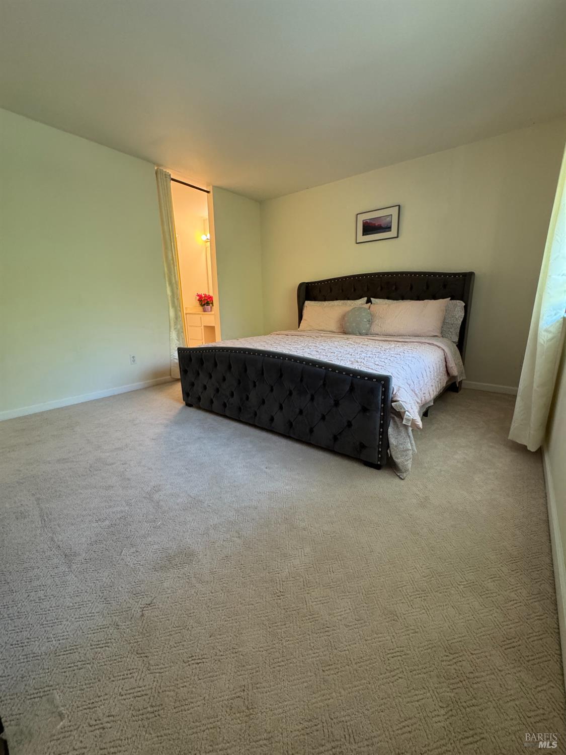 58 Scottsdale Way Novato, CA 94947 - Photo 34 of 64 a spacious bedroom with a bed and window