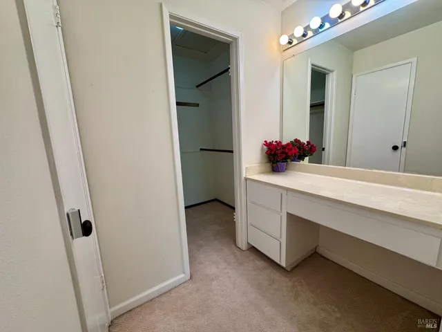 a bathroom with a toilet a sink and shower