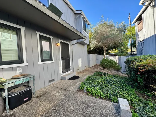 a backyard of a house with lots of green space