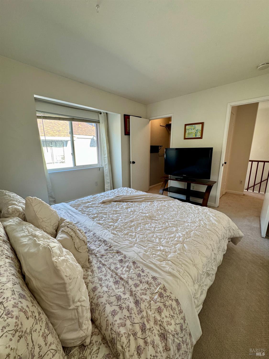 58 Scottsdale Way Novato, CA 94947 - Photo 46 of 64 a bedroom with a bed and a dresser