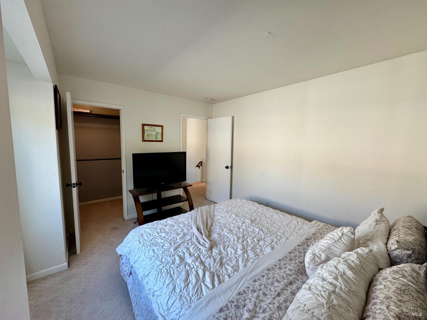 58 Scottsdale Way Novato, CA 94947 - Photo 47 of 64 a bedroom with a bed and a television