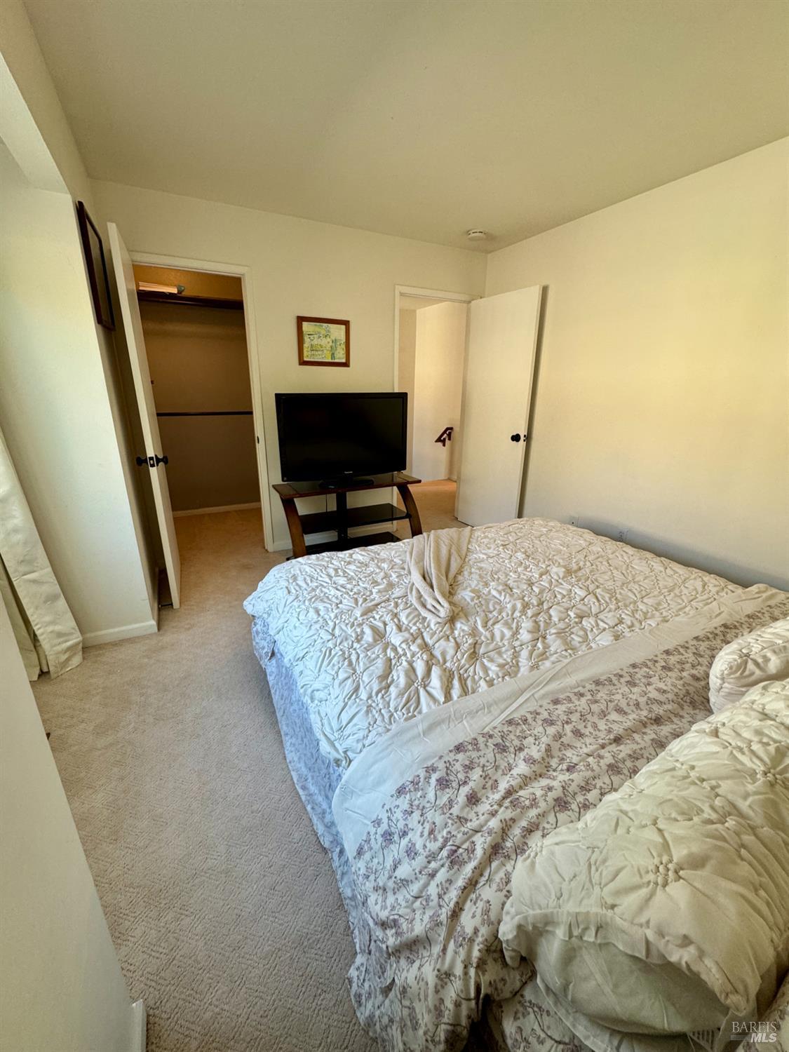 58 Scottsdale Way Novato, CA 94947 - Photo 48 of 64 a bedroom with a bed and a couch