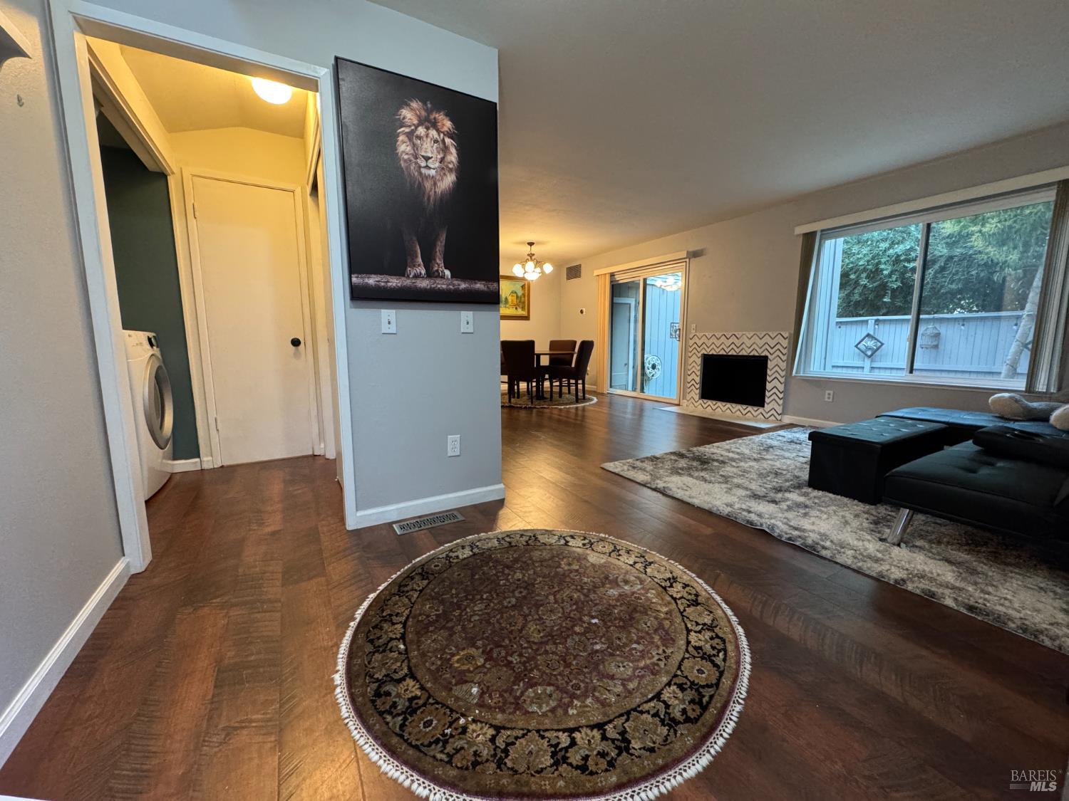 58 Scottsdale Way Novato, CA 94947 - Photo 5 of 64 a view of a living room and a fireplace