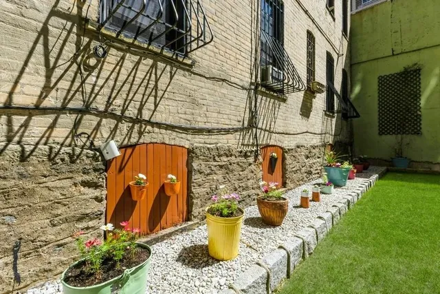 a view of swimming pool from a outdoor seating
