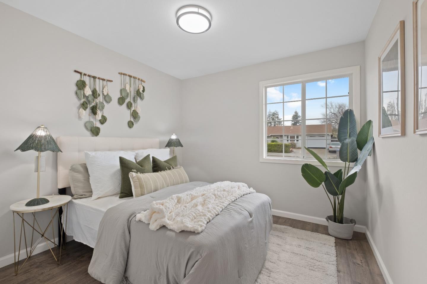 1732 Fallbrook Avenue San Jose, CA 95130 - Photo 34 of 54 a bedroom with a bed and a window