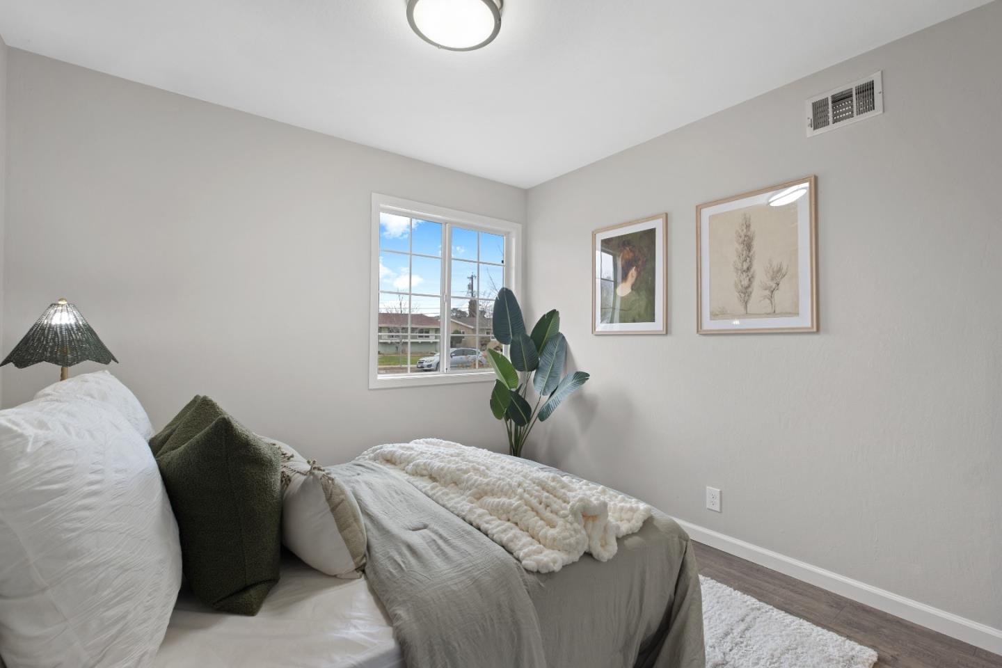 1732 Fallbrook Avenue San Jose, CA 95130 - Photo 35 of 54 a bedroom with a bed and a window
