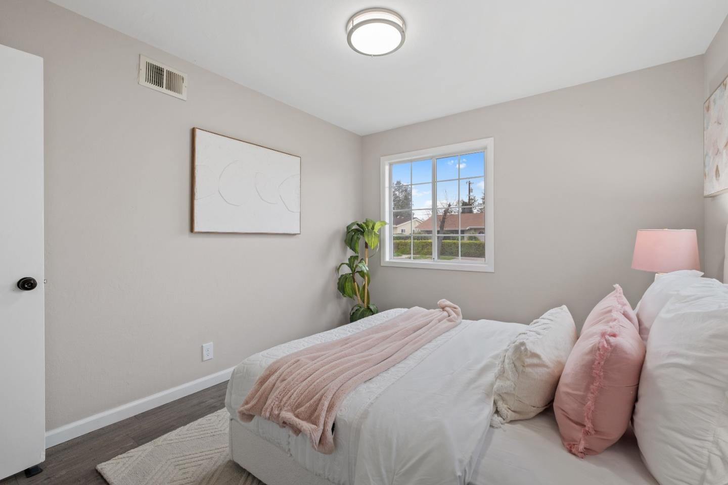 1732 Fallbrook Avenue San Jose, CA 95130 - Photo 38 of 54 a bedroom with a bed and a window