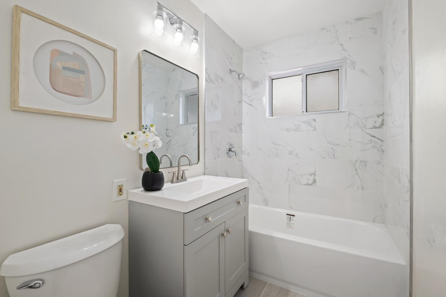 1732 Fallbrook Avenue San Jose, CA 95130 - Photo 40 of 54 a bathroom with a sink a toilet and shower