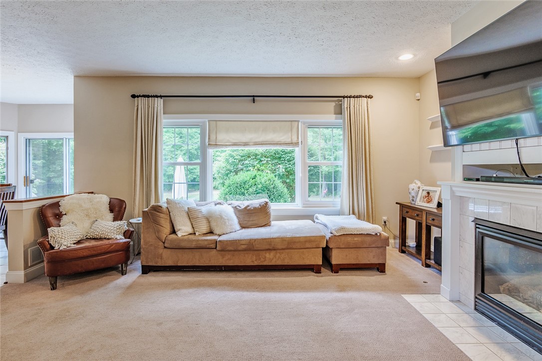 320 Sunningdale Rise Webster, NY 14580 - Photo 17 of 50 Big Window along the back of the house that lets i