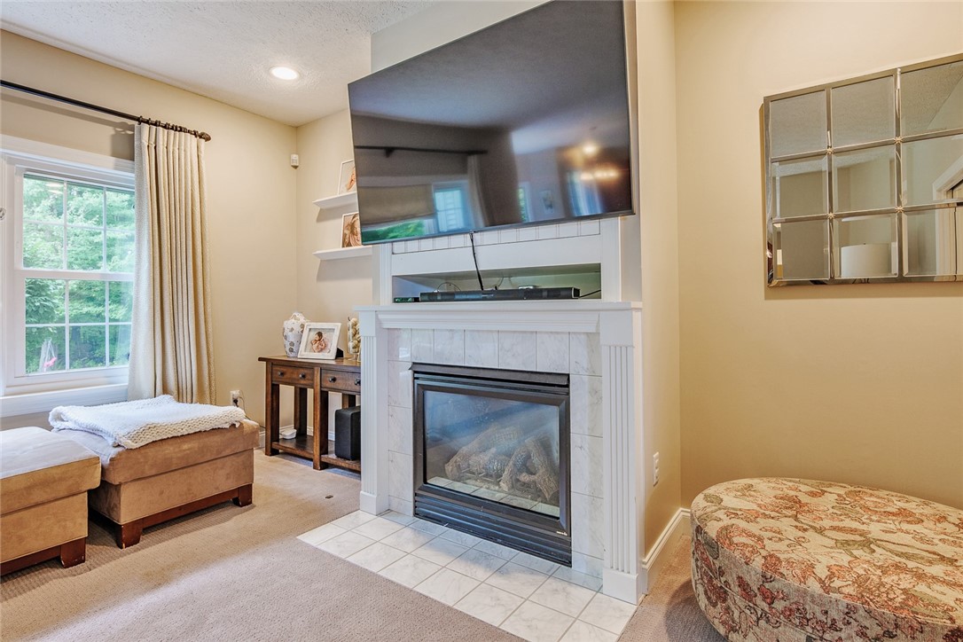 320 Sunningdale Rise Webster, NY 14580 - Photo 18 of 50 Warm up by this cozy fireplace!