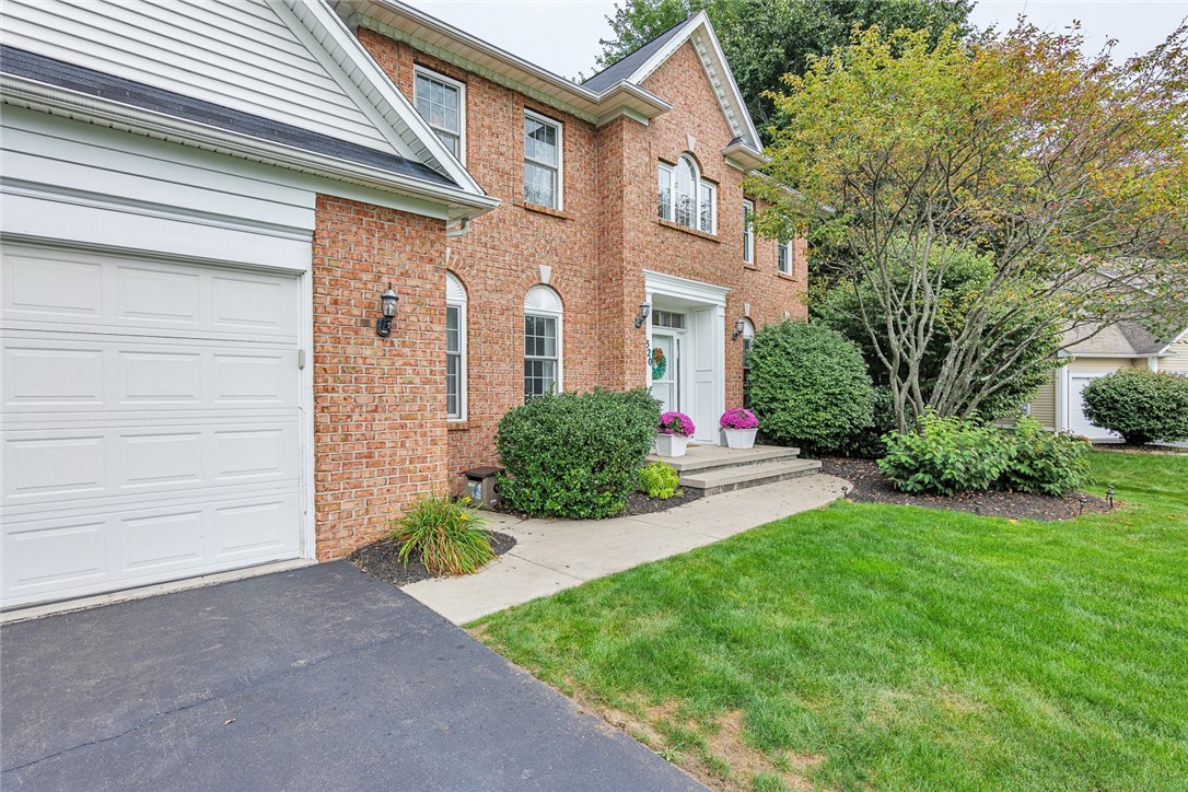 320 Sunningdale Rise Webster, NY 14580 - Photo 2 of 50 This elegant and impressive brick-fronted home is