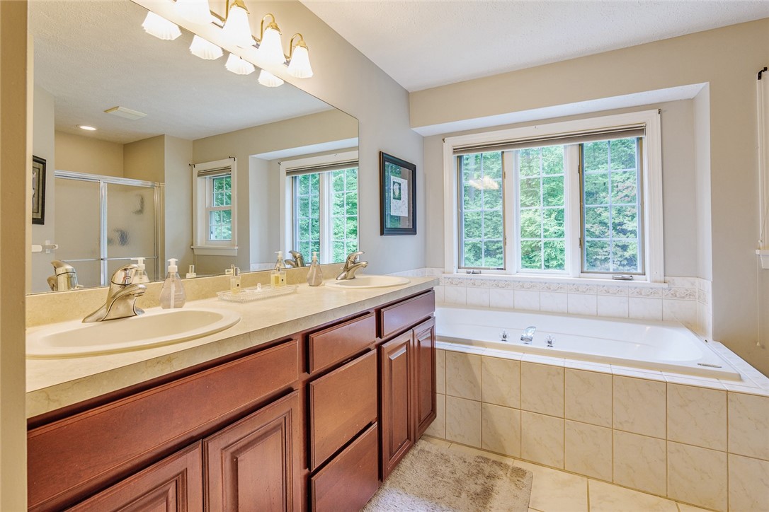320 Sunningdale Rise Webster, NY 14580 - Photo 24 of 50 Stepping inside the en-suite Primary Bathroom! DOU