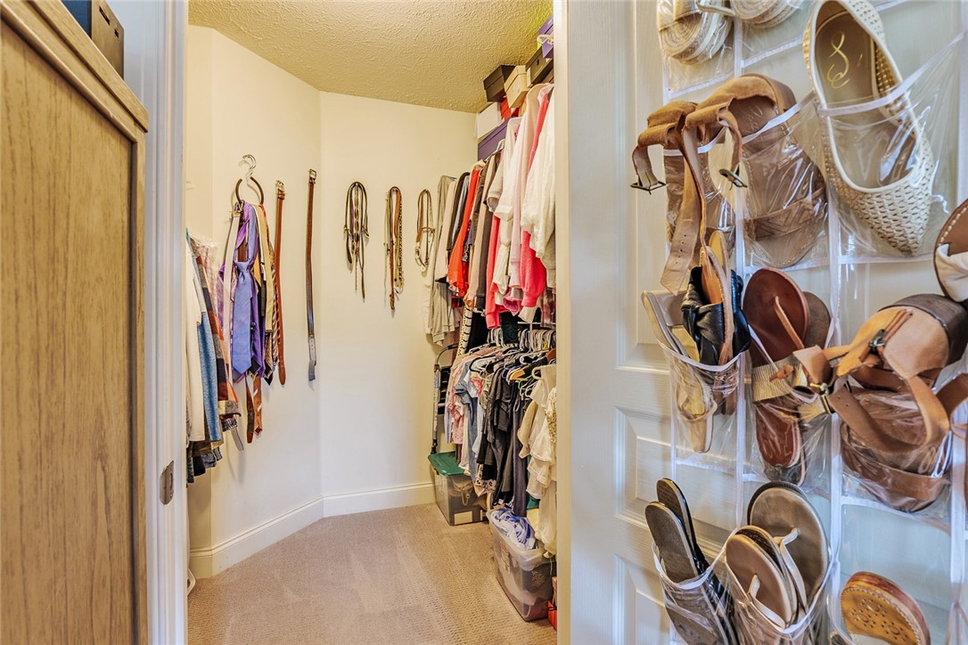 320 Sunningdale Rise Webster, NY 14580 - Photo 26 of 50 H U G E walk in closet in the primary suite!!