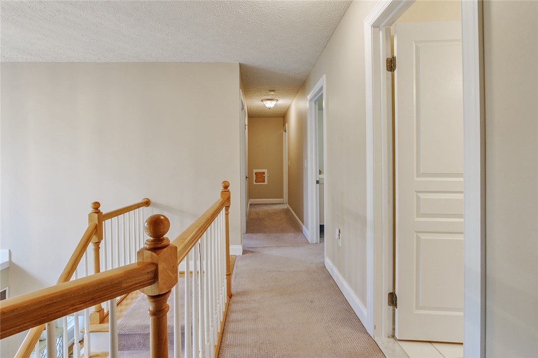 320 Sunningdale Rise Webster, NY 14580 - Photo 28 of 50 View out of the Primary Suite looking down the 2nd