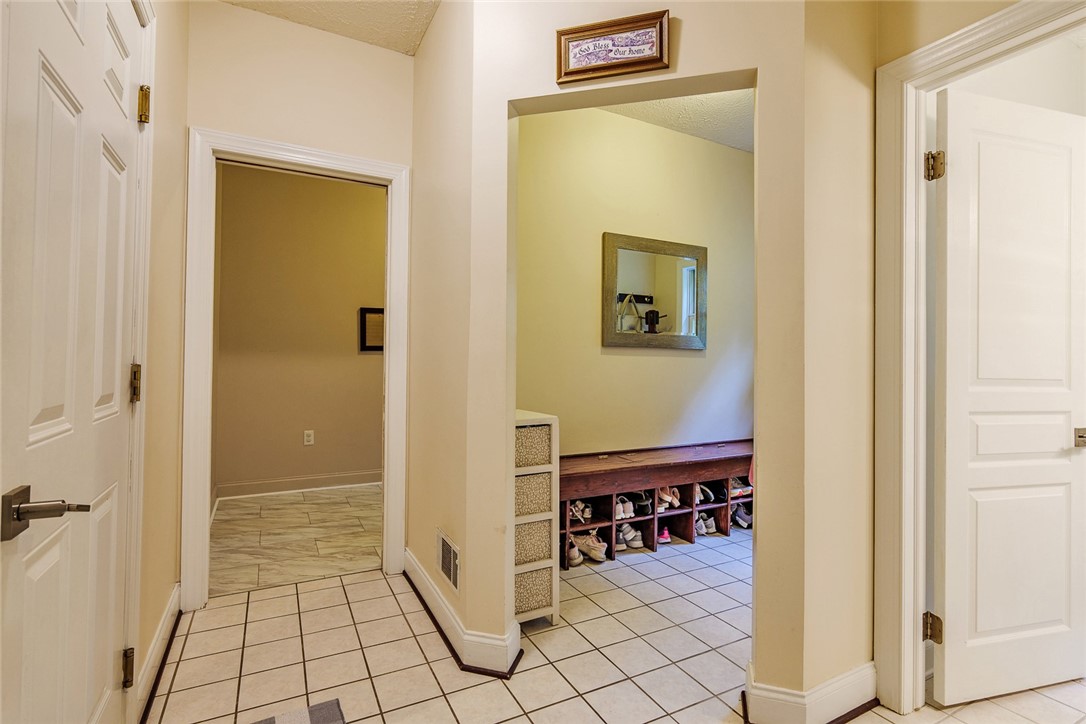 320 Sunningdale Rise Webster, NY 14580 - Photo 36 of 50 Entrance hall after stepping through the garage...