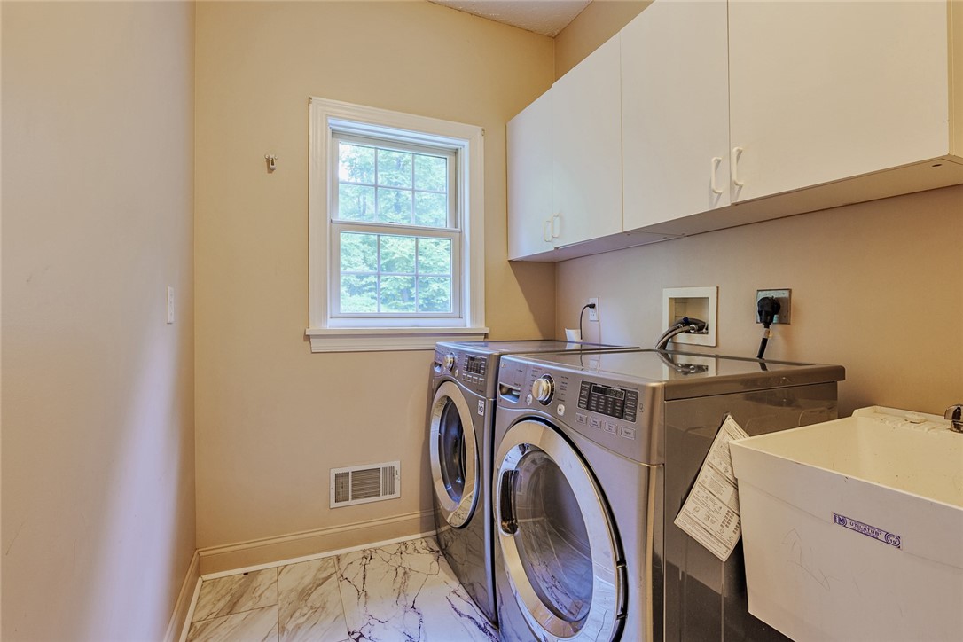 320 Sunningdale Rise Webster, NY 14580 - Photo 39 of 50 MASSIVE Walk-In 1st Floor Laundry Room!!
