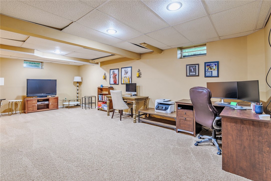 320 Sunningdale Rise Webster, NY 14580 - Photo 40 of 50 Stepping down into your FULLY FINISHED BASEMENT!!