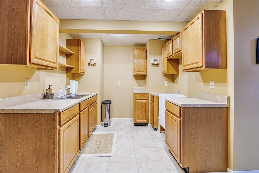 320 Sunningdale Rise Webster, NY 14580 - Photo 43 of 50 FULL KITCHENETTE IN THE BASEMENT!! Amazing for ent