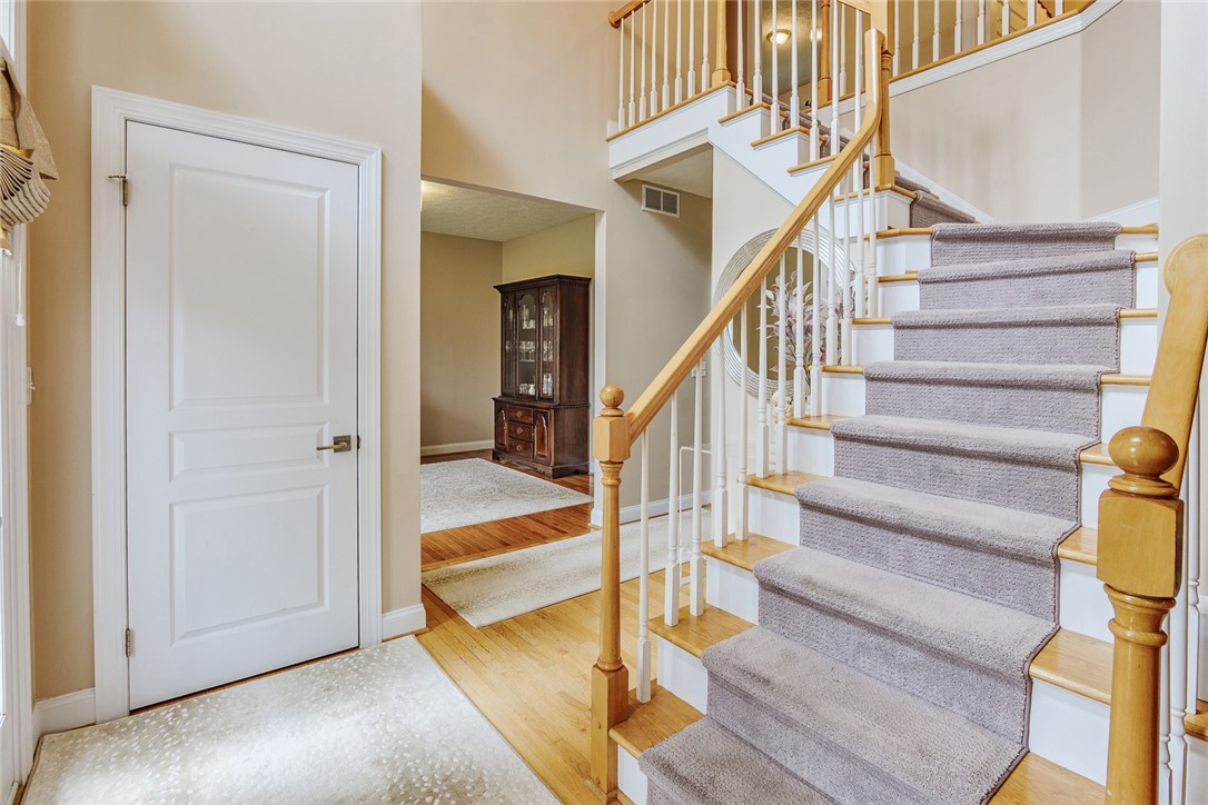 320 Sunningdale Rise Webster, NY 14580 - Photo 5 of 50 Gleaming natural hardwoods will navigate you throu