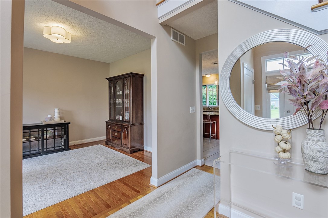 320 Sunningdale Rise Webster, NY 14580 - Photo 6 of 50 To the left here, is the formal dining space, curr