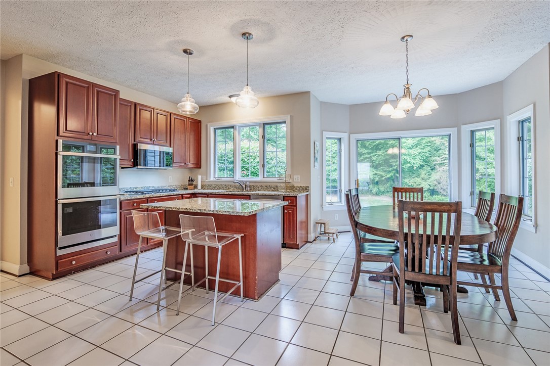 320 Sunningdale Rise Webster, NY 14580 - Photo 9 of 50 H U G E kitchen!! BIG, OPEN, and BRIGHT! HUGE ISL