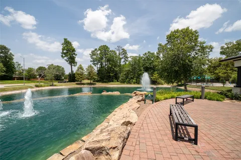 a view of a lake with a house