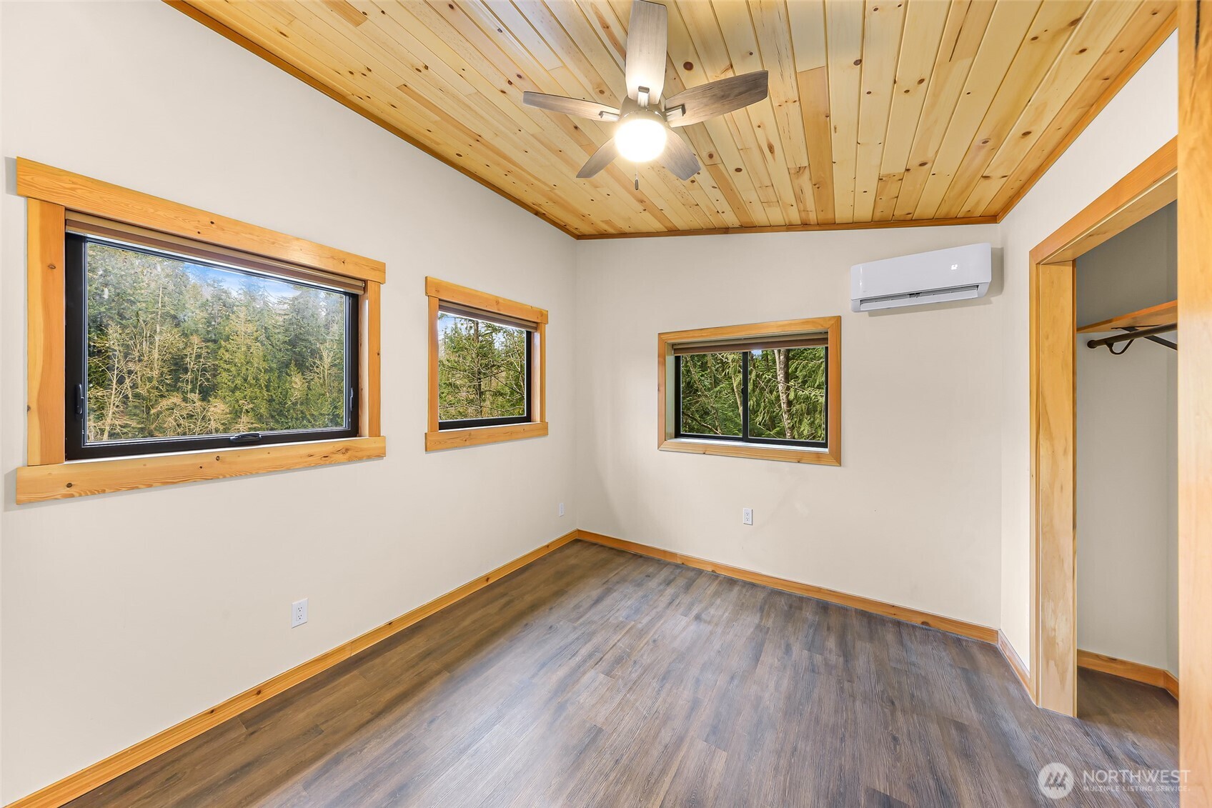 1693 Pebble Beach Trail Bellingham, WA 98226 - Photo 24 of 33 a view of an empty room with a window and wooden floor