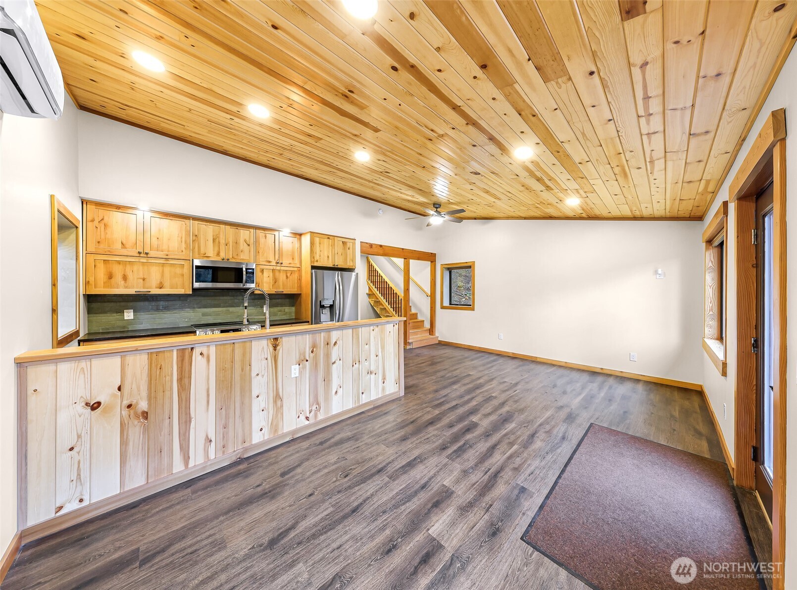 1693 Pebble Beach Trail Bellingham, WA 98226 - Photo 9 of 33 a view of a hallway with wooden floor