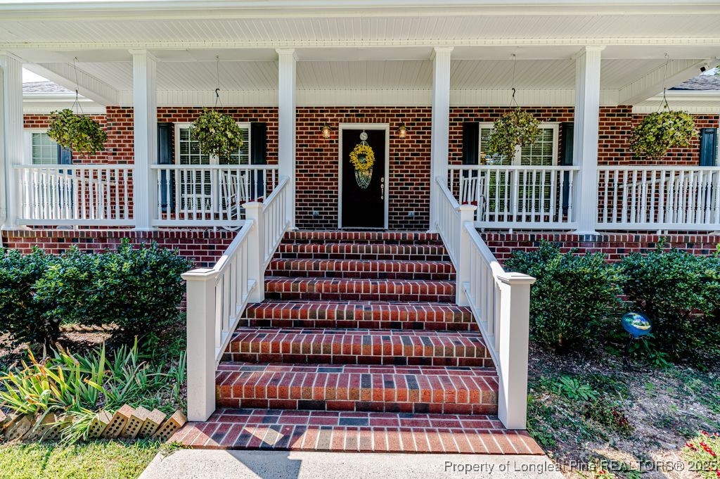 4635 Farrell Road Sanford, NC 27330 - Photo 3 of 30 a view of a house with a porch