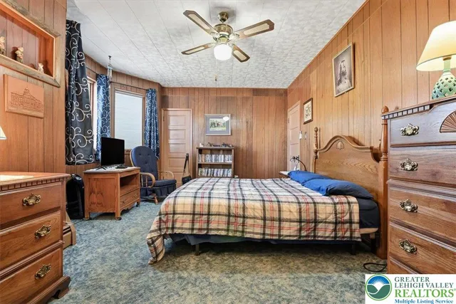 a bedroom with a bed and furniture