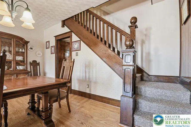 a view of entryway with wooden floor
