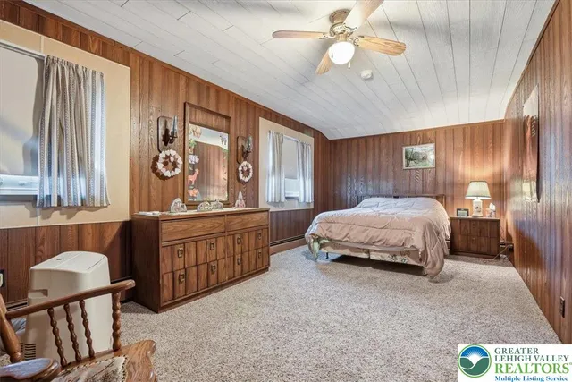 a room with furniture and air hockey table