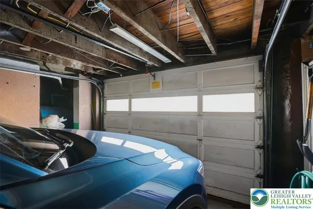 a view of a backyard with pathway