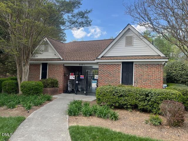 5115 Cardinal Grove Boulevard Raleigh, NC 27616 - Photo 29 of 36 a front view of a house with yard and trees