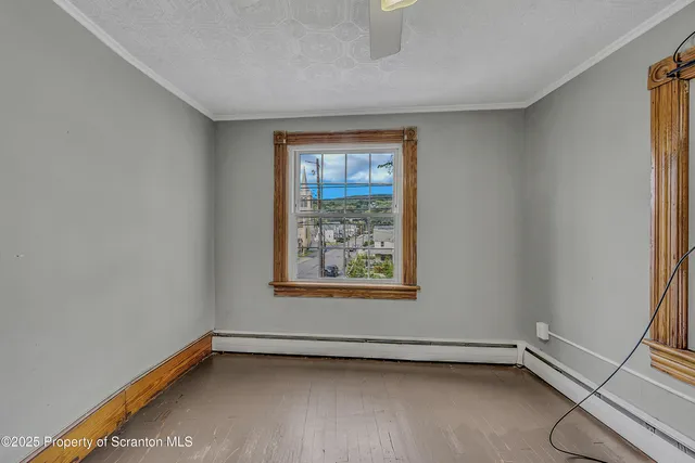 a view of a room with a window