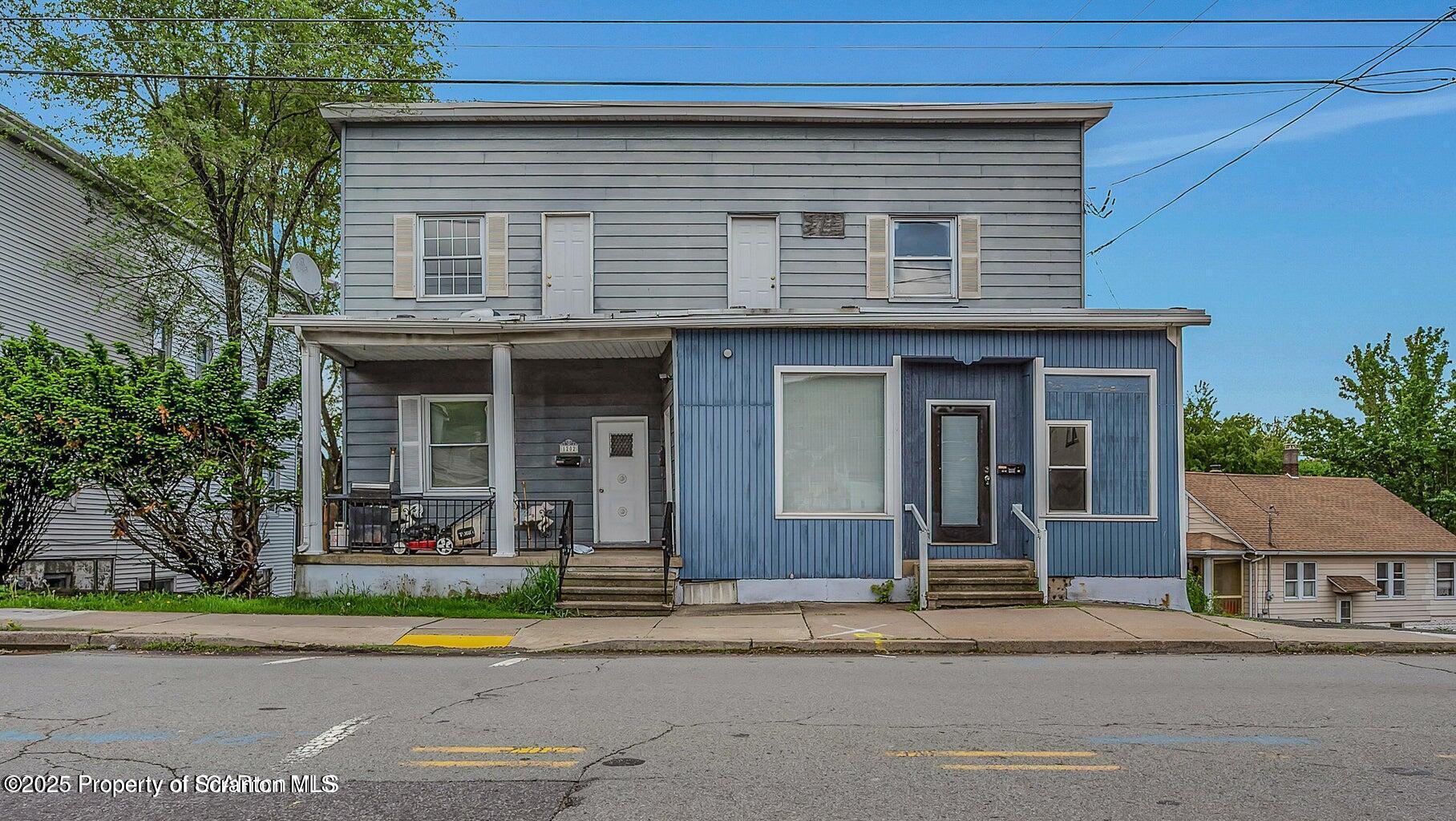 1202 Main Street Dickson City, PA 18519 - Photo 20 of 30 a front view of a house