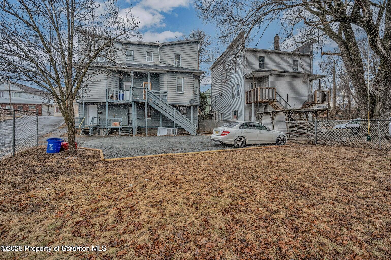 1202 Main Street Dickson City, PA 18519 - Photo 23 of 30 a front view of a house with garden